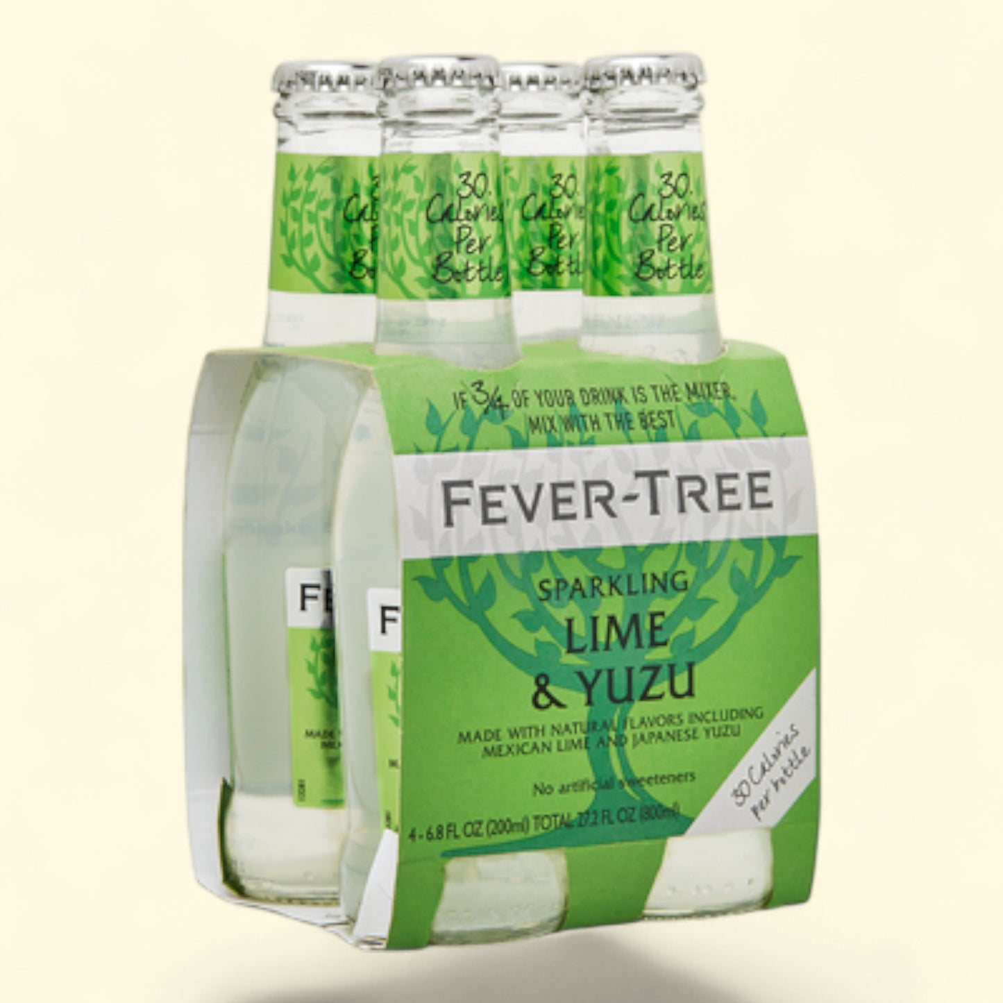 Pack of Fever-Tree sparkling lime & yuzu bottles on a white background