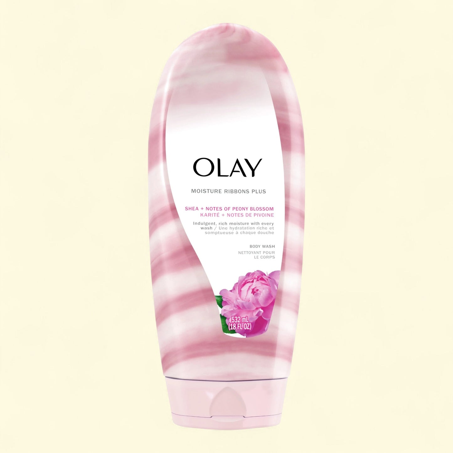 Olay body wash with pink and white design on a light yellow background