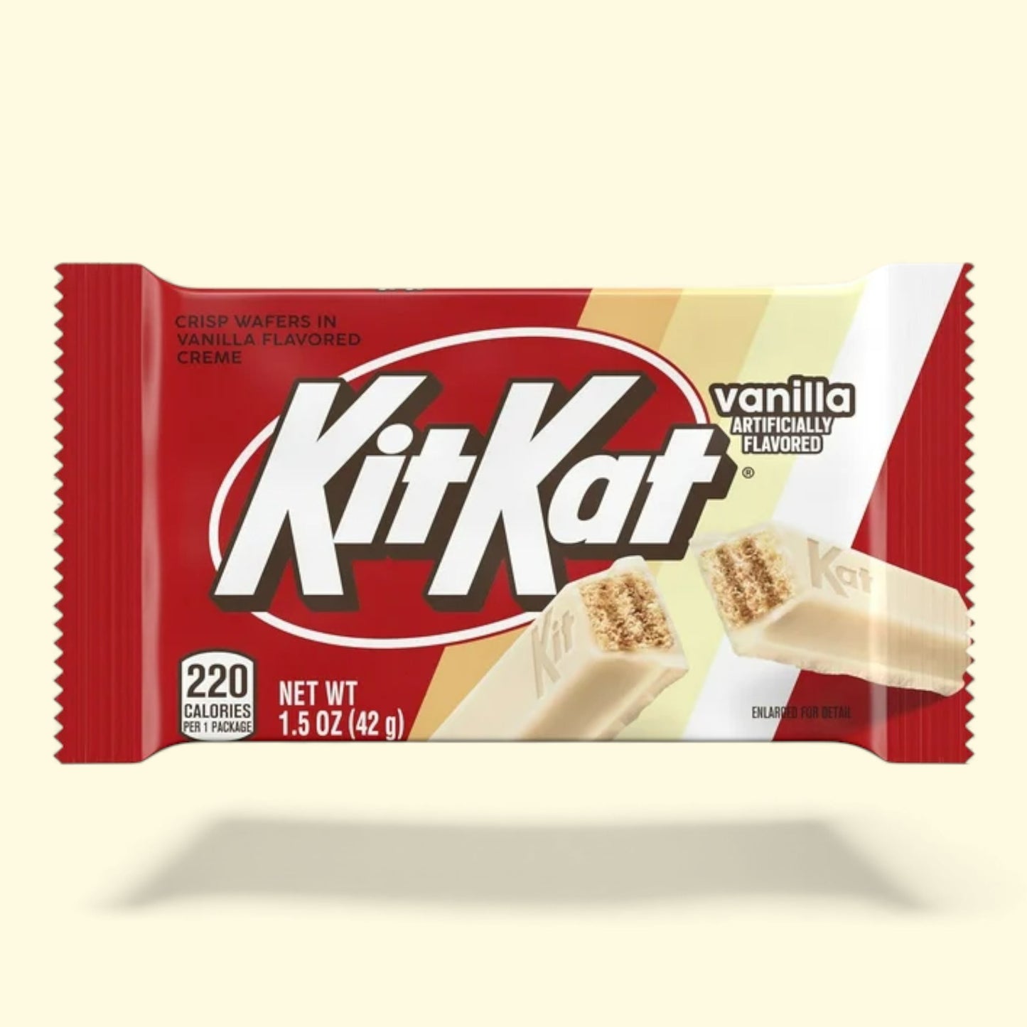Kit Kat vanilla flavored chocolate bar packaging on a beige background