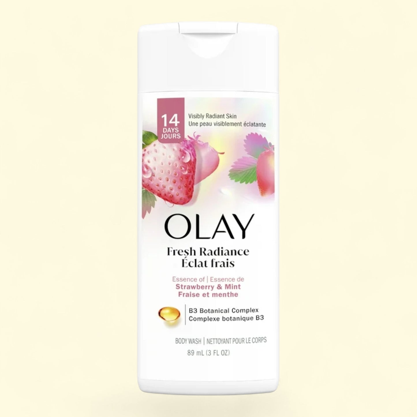 Olay Fresh Radiance body wash packaging with strawberry and mint graphics on a light yellow background