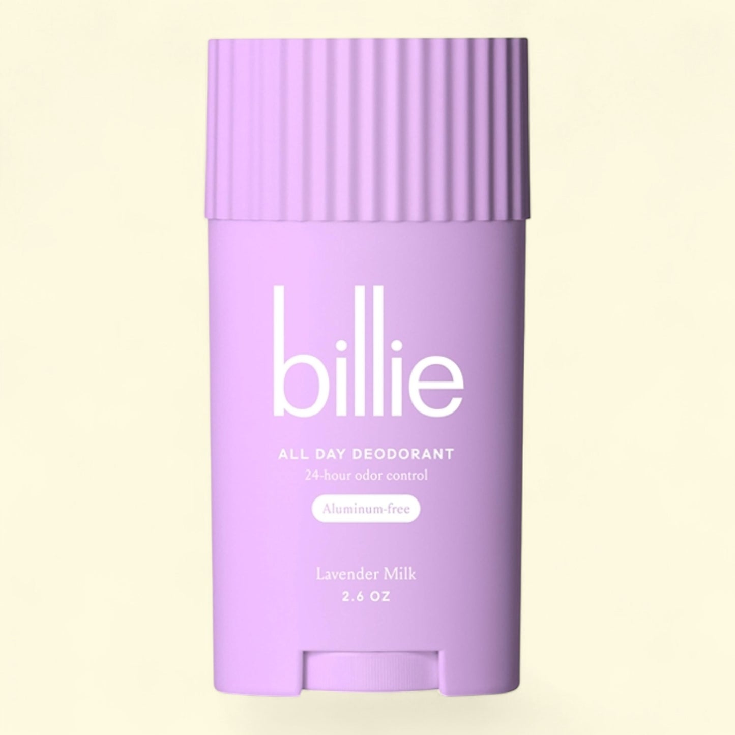Purple deodorant stick with 'billie' branding on a light yellow background