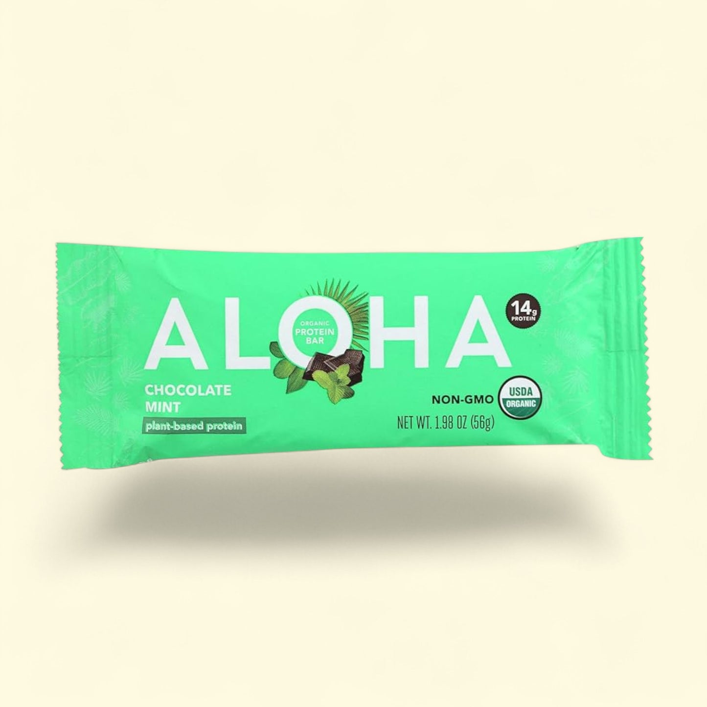 Green protein bar packaging with 'Aloha' branding on a beige background