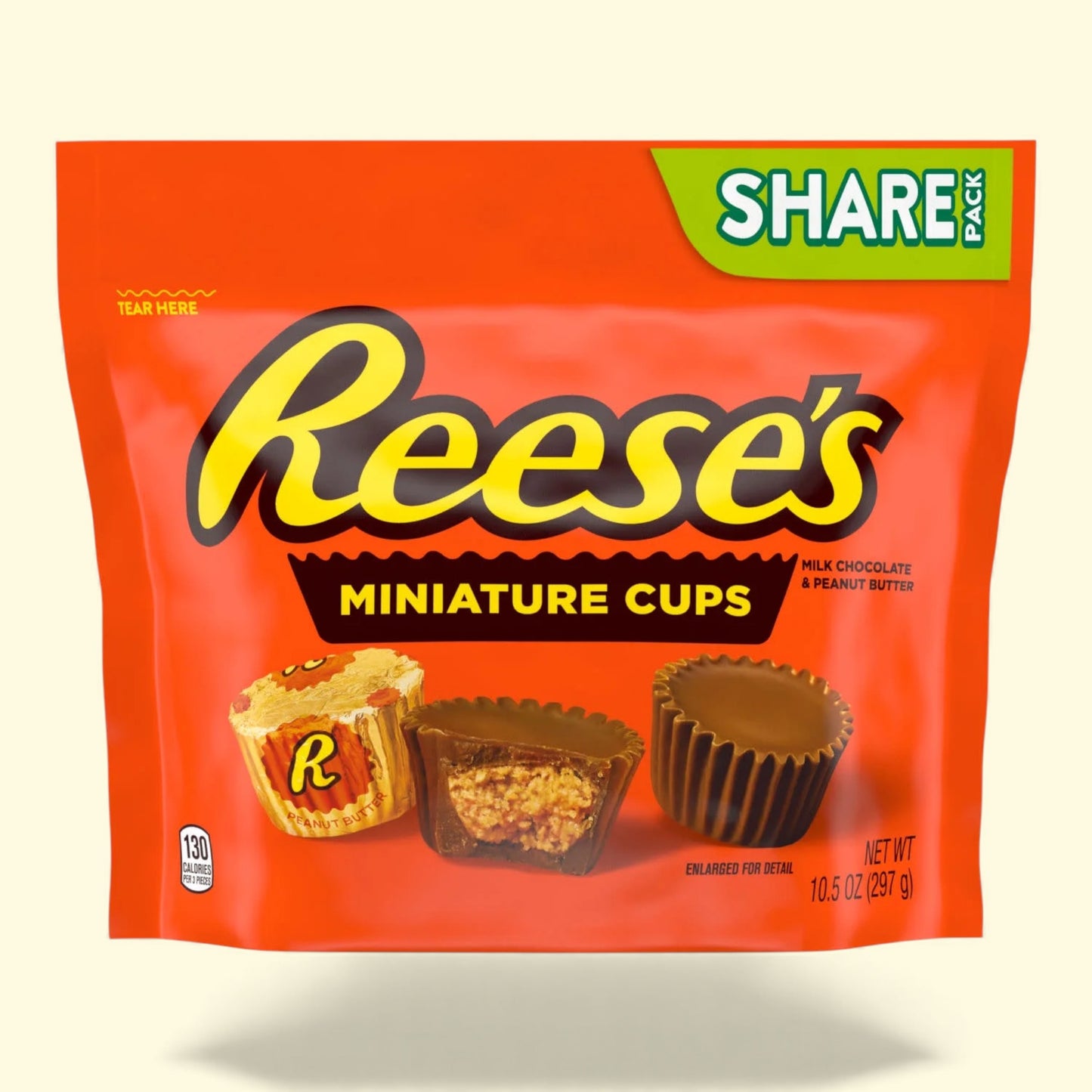 Reese's Miniature Cups candy package on a beige background
