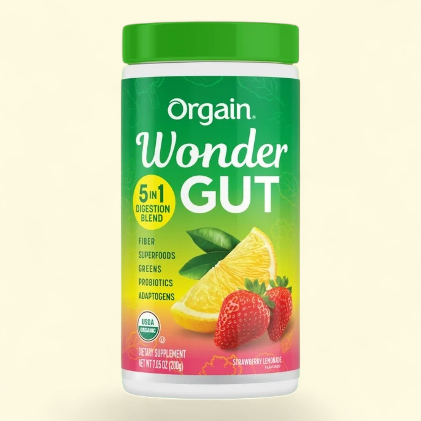 Orgain Wonder Gut supplement container with green lid and colorful label on a beige background