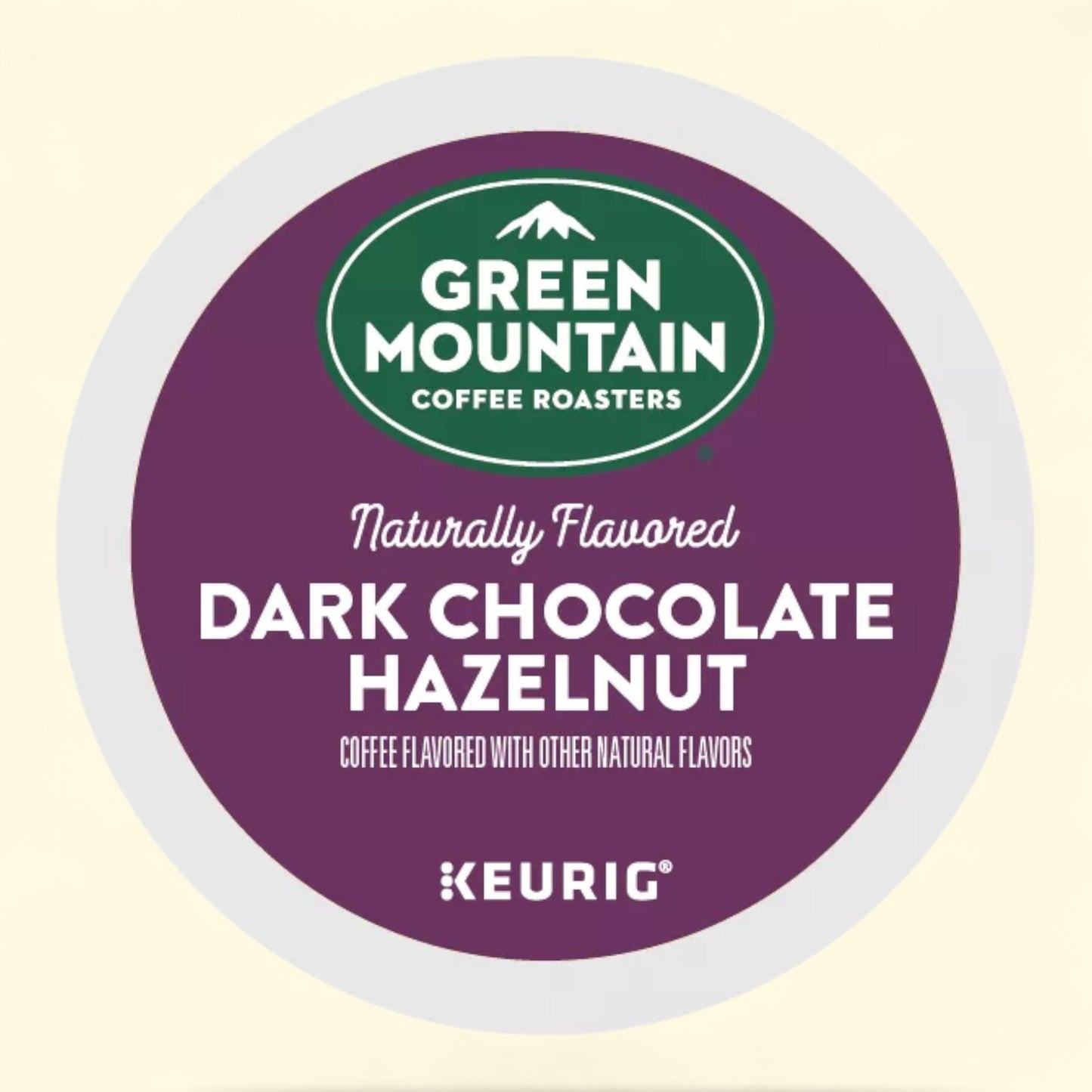 Green Mountain Coffee Roasters naturally flavored Dark Chocolate Hazelnut coffee pod on a beige background