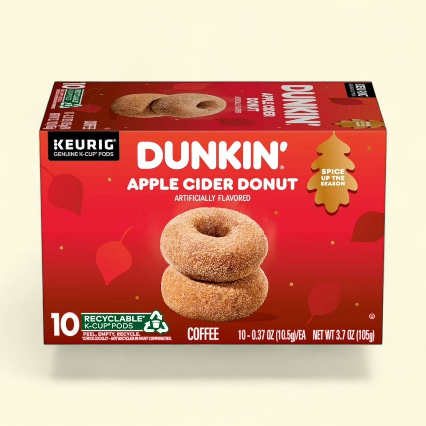 Dunkin' Apple Cider Donut coffee package with red background and donut illustration.