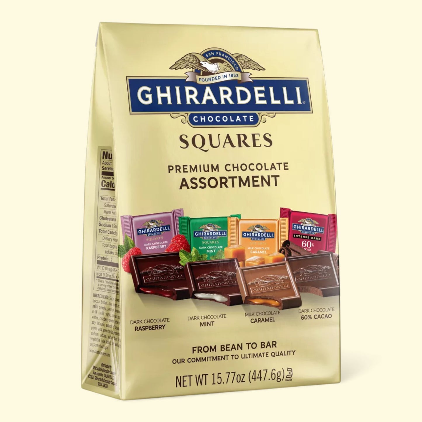 Ghirardelli chocolate squares packaging on a beige background