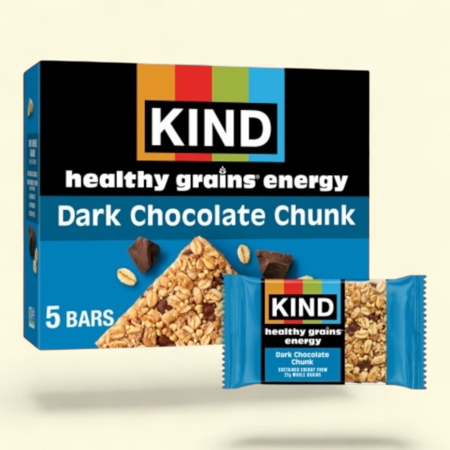 Box of KIND Dark Chocolate Chunk energy bars on a beige background