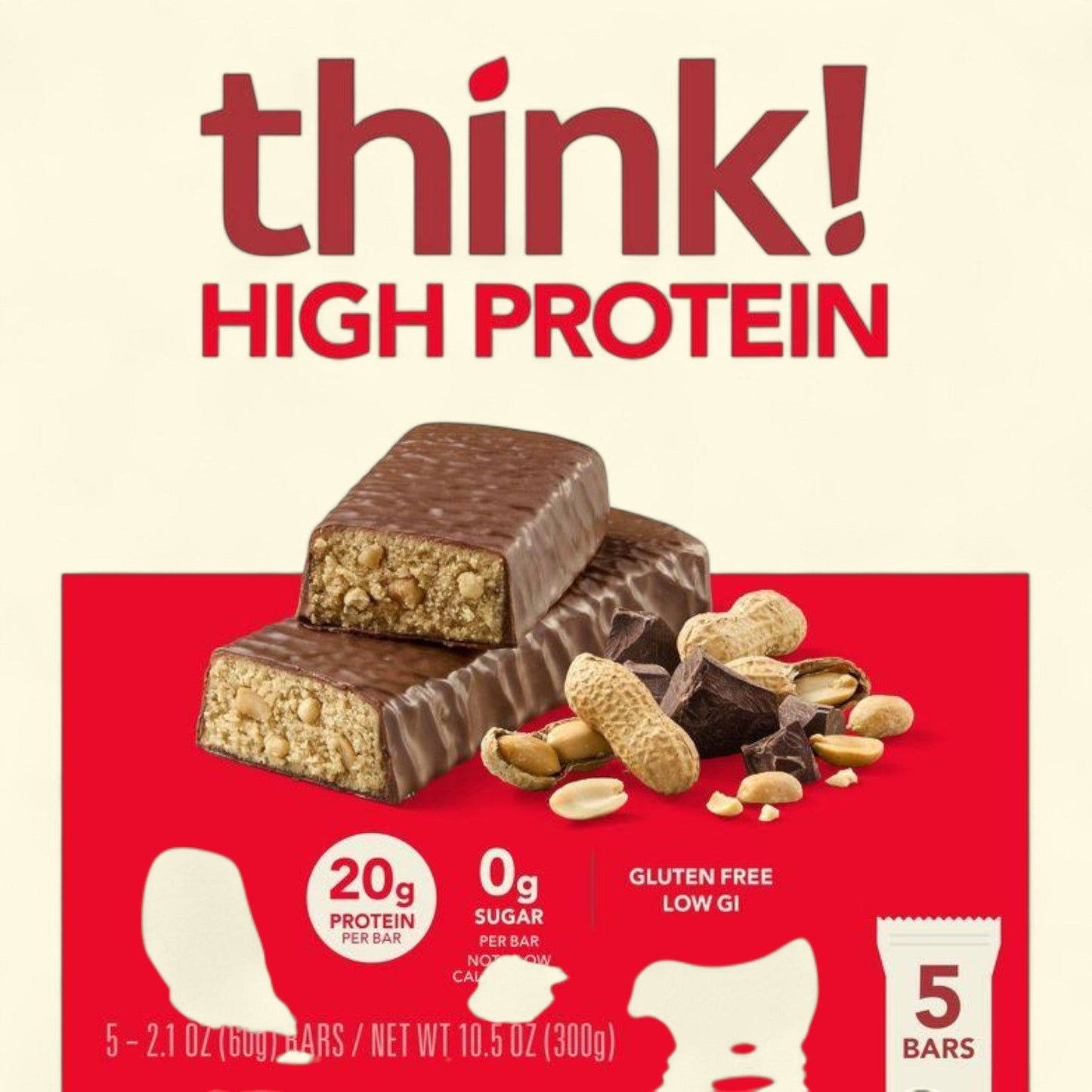 think! High Protein bars packaging with chocolate and peanut flavor on a red and beige background.