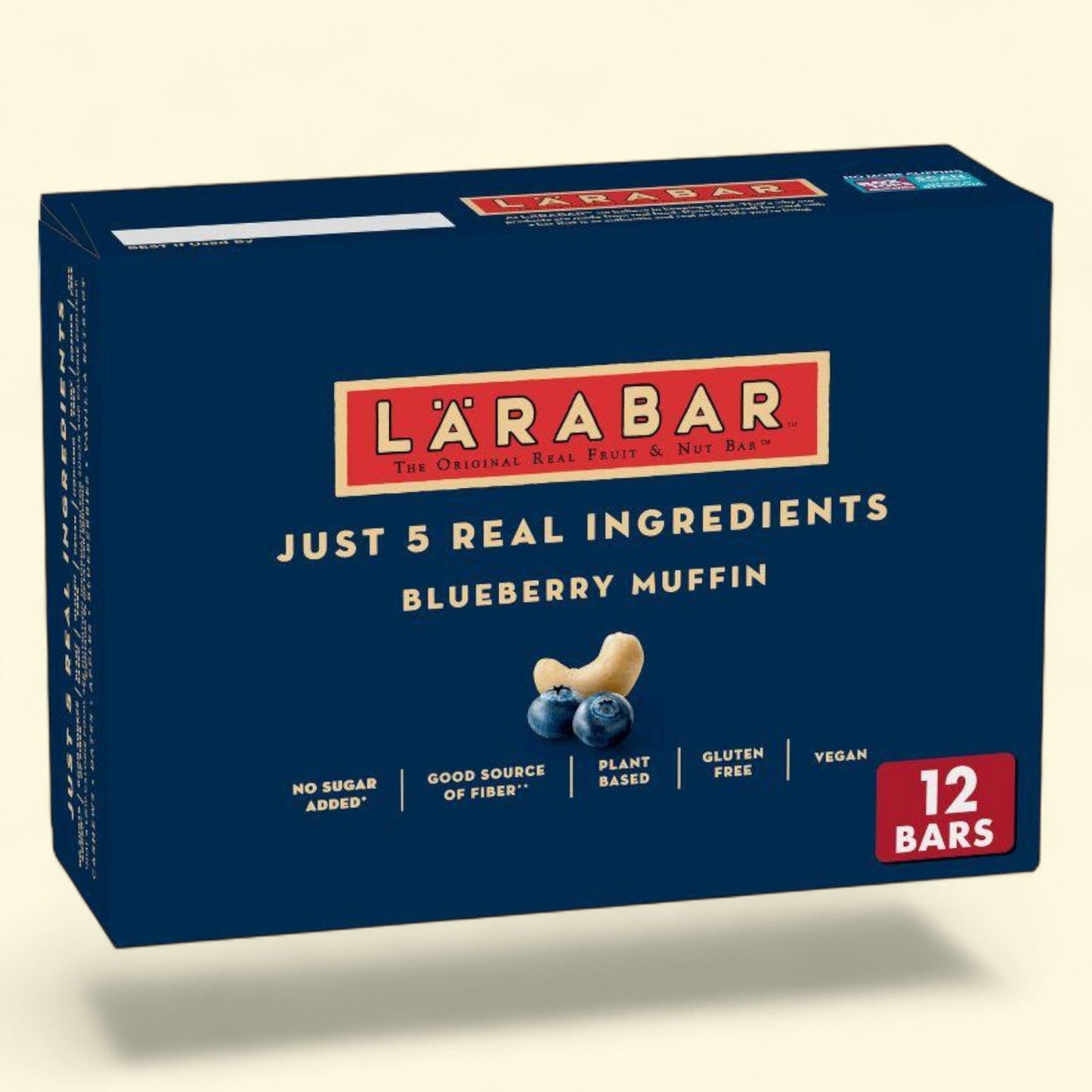 Box of Larabar Blueberry Muffin flavor on a beige background