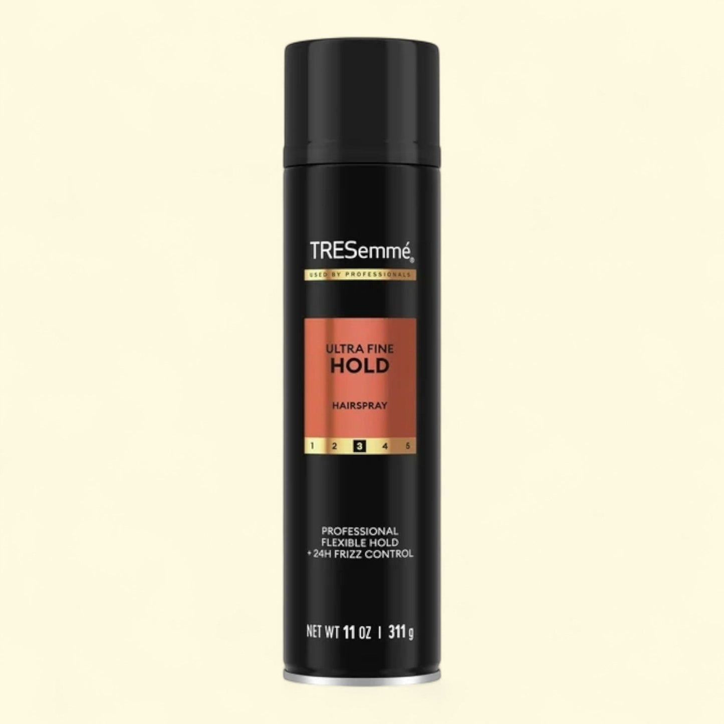 TRESemme ultra fine hold hairspray bottle on a black background