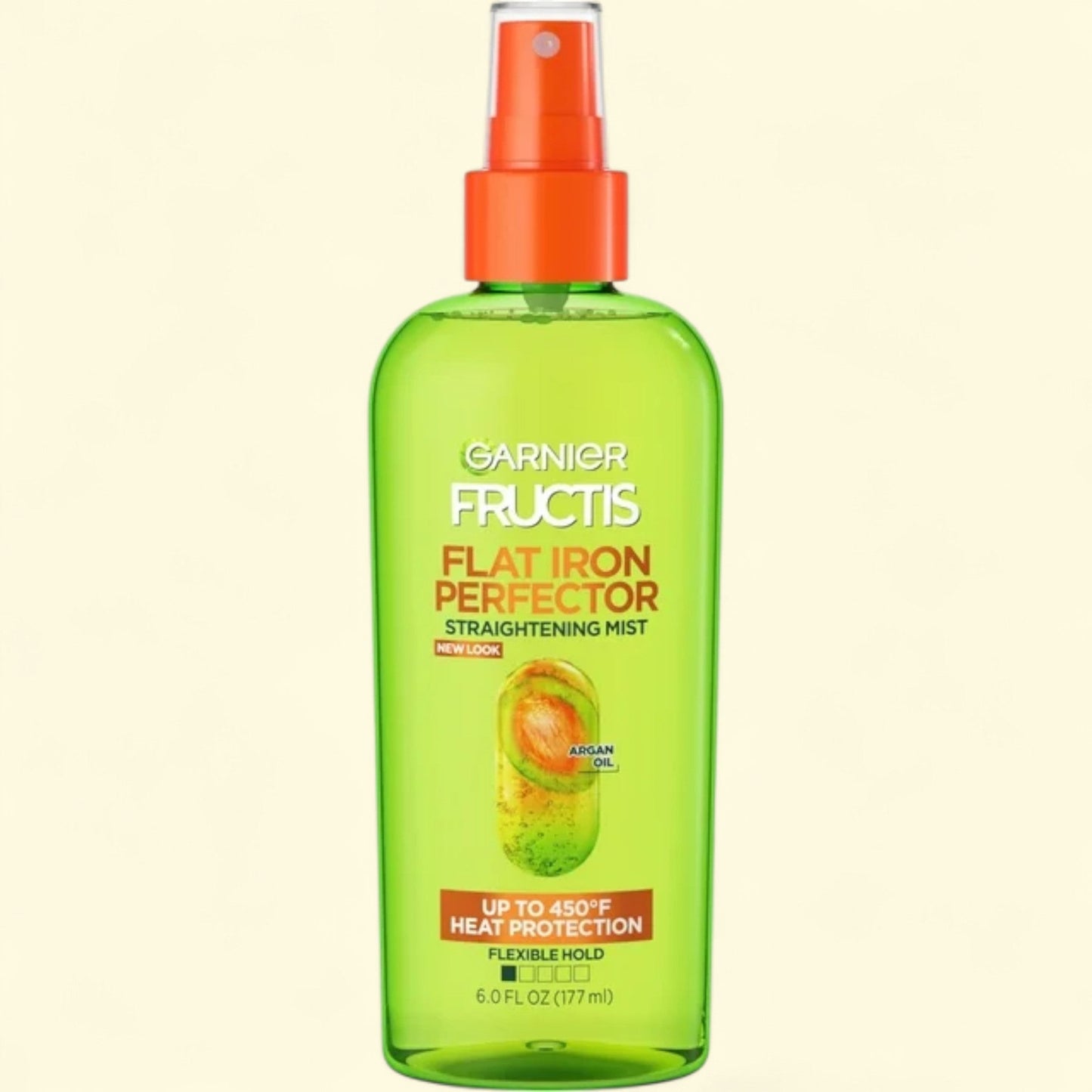 Garnier Fructis Flat Iron Perfector spray bottle on a beige background