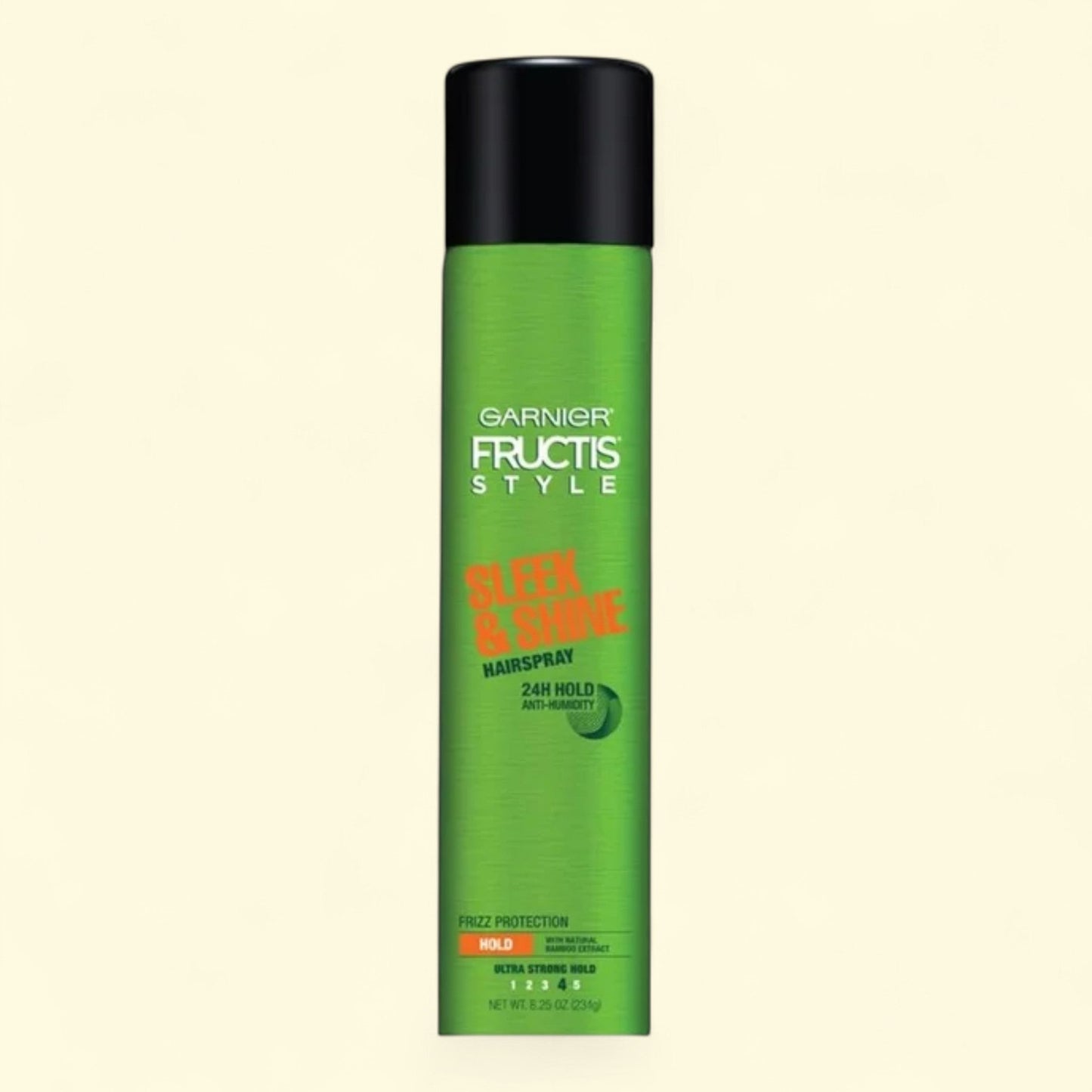 Garnier Fructis Style hairspray can on a beige background