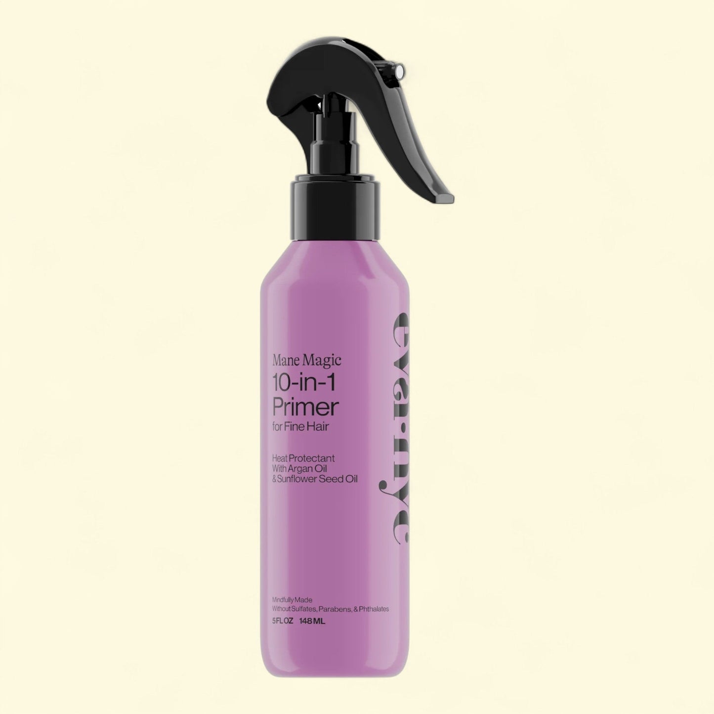 Purple spray bottle labeled '10-in-1 Primer' on a beige background