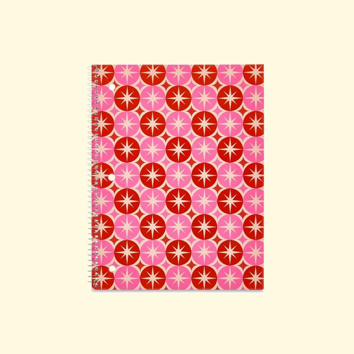 Notebook with a red and pink geometric pattern