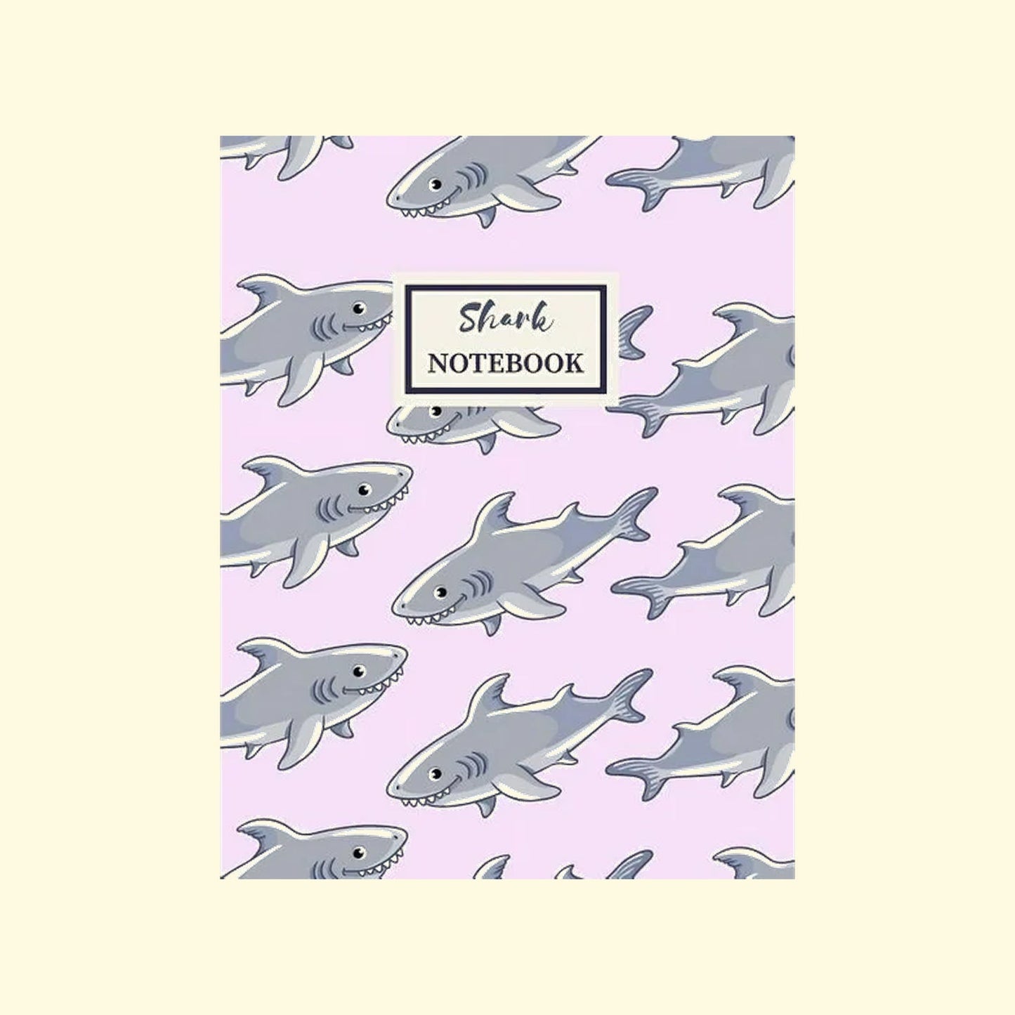 Notebook with shark pattern on a light purple background