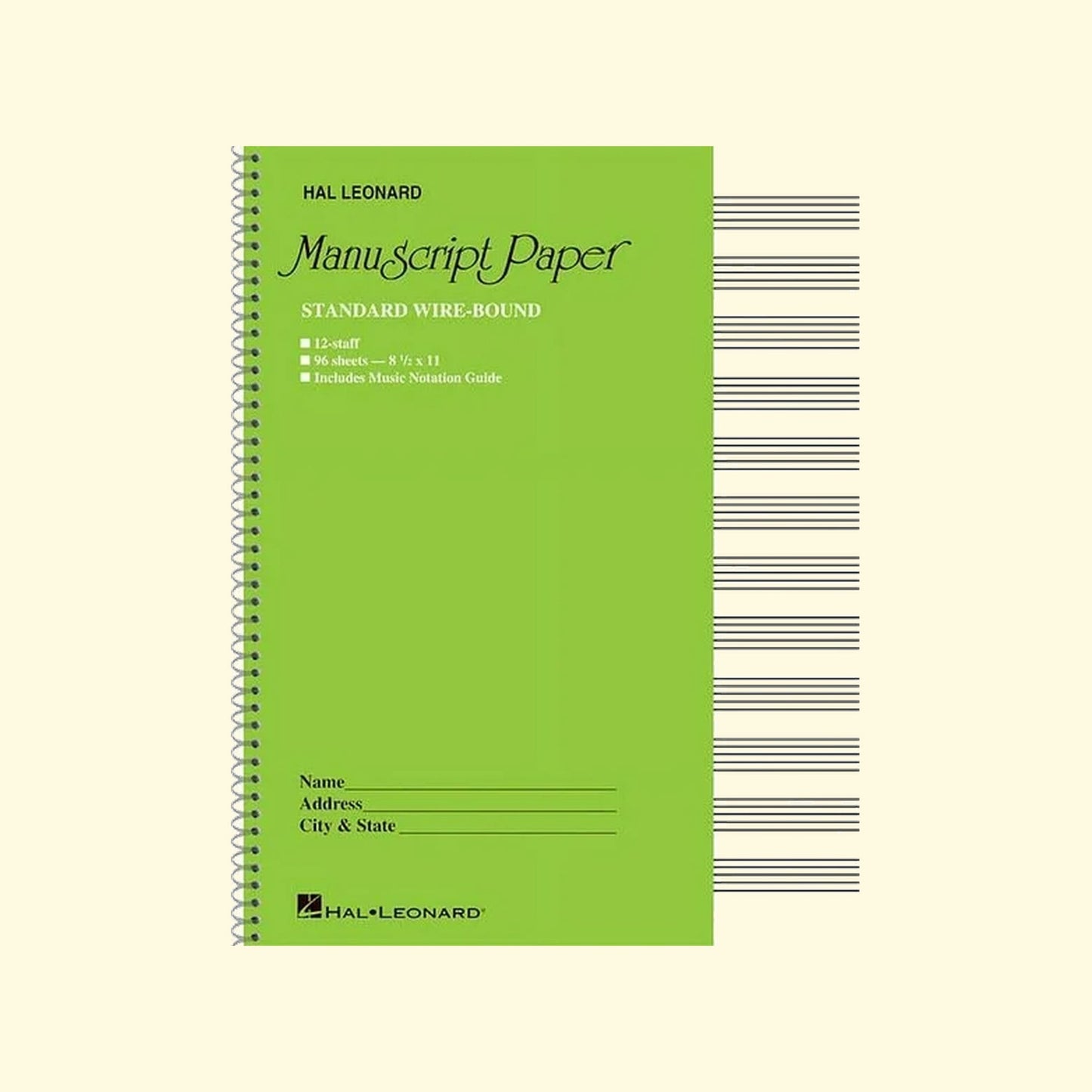 Green spiral-bound notebook labeled 'Manuscript Paper' by Hal Leonard on a beige background