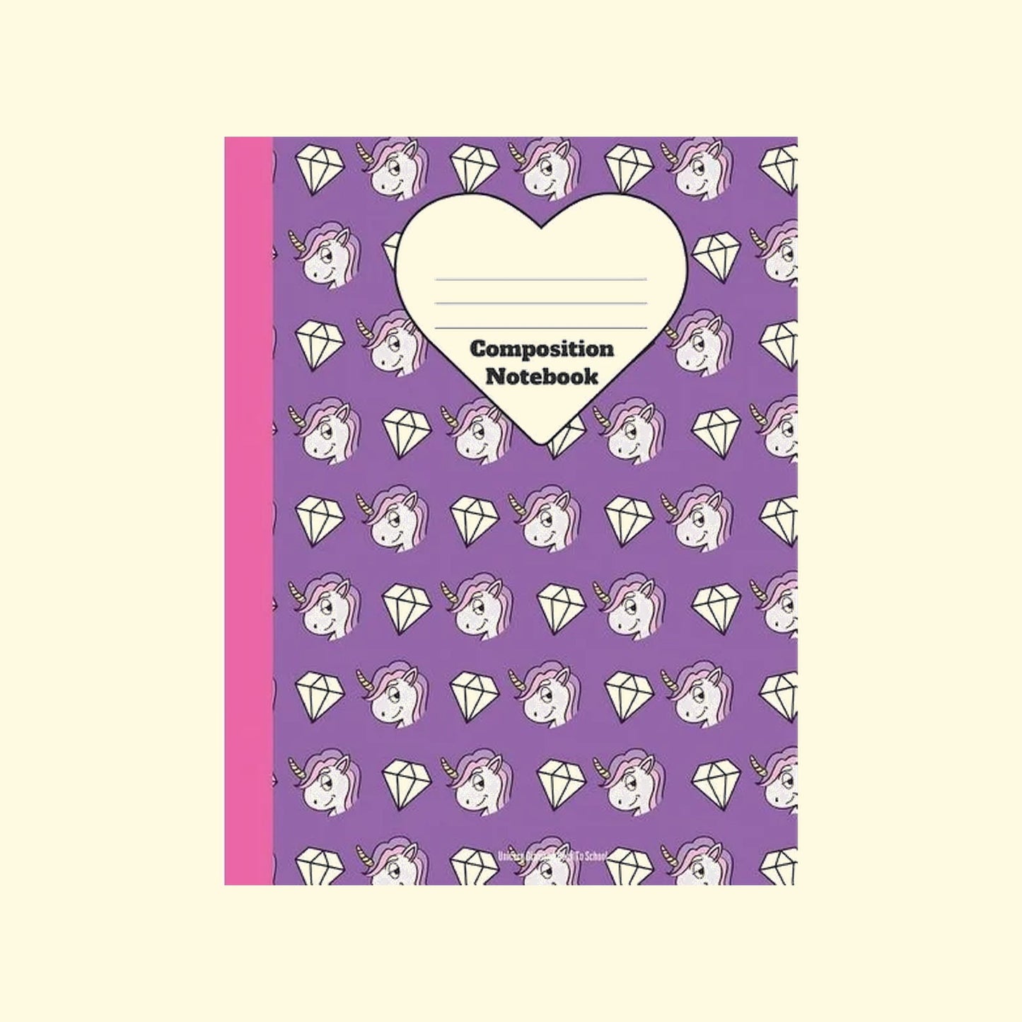 Composition notebook with unicorn and diamond pattern on a purple cover