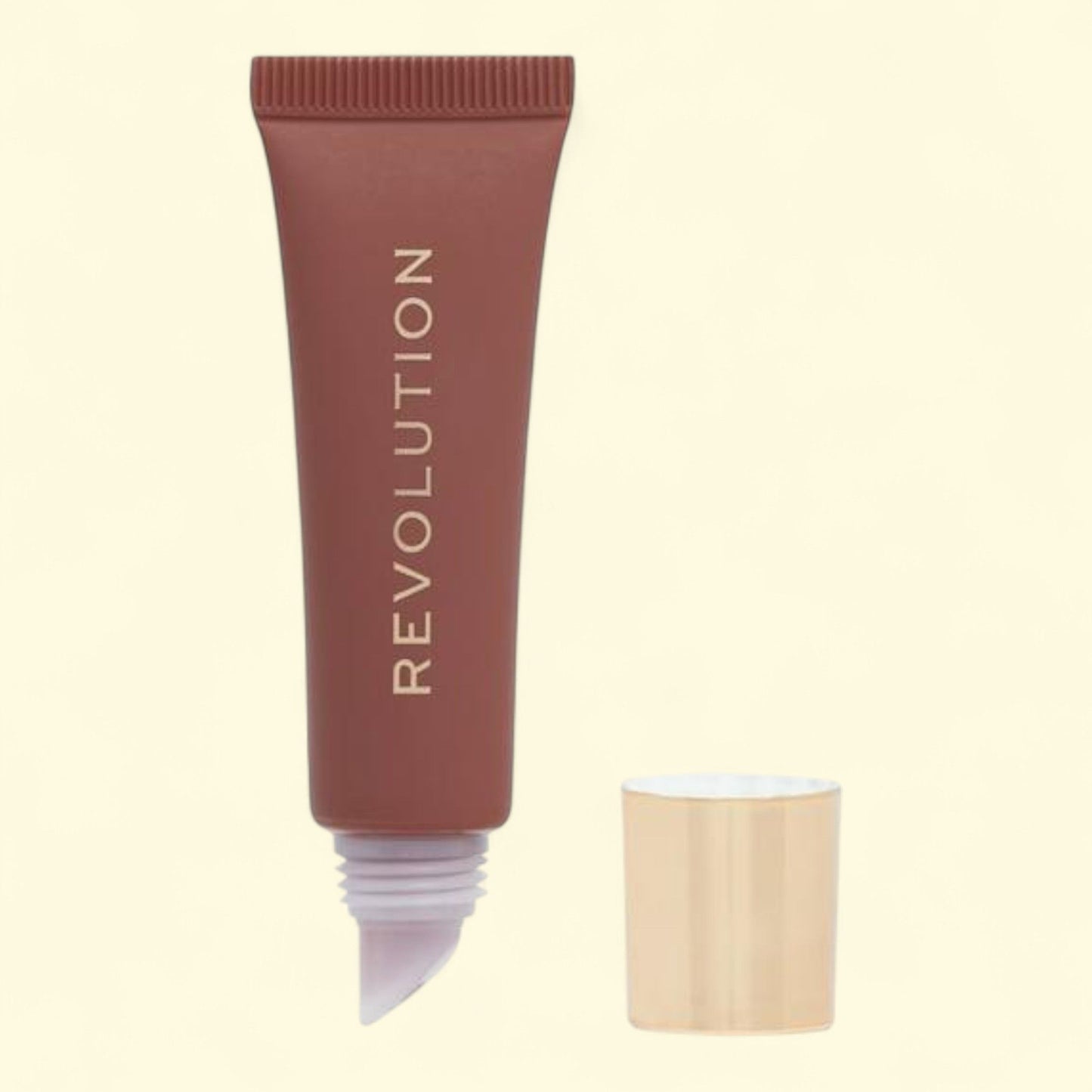 Revolution Juicy Peptide Lip Balm, Nude Latte 1 coun — authentic US product shipped worldwide by Treatspree