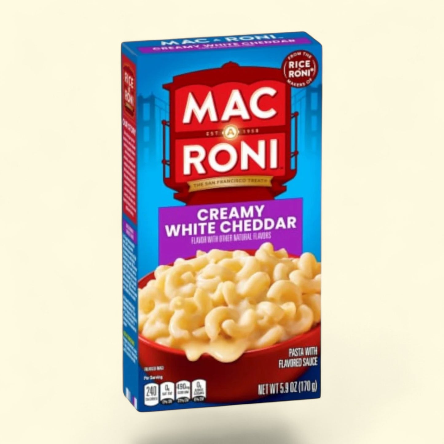 Box of Mac a Roni Creamy White Cheddar macaroni and cheese on a beige background