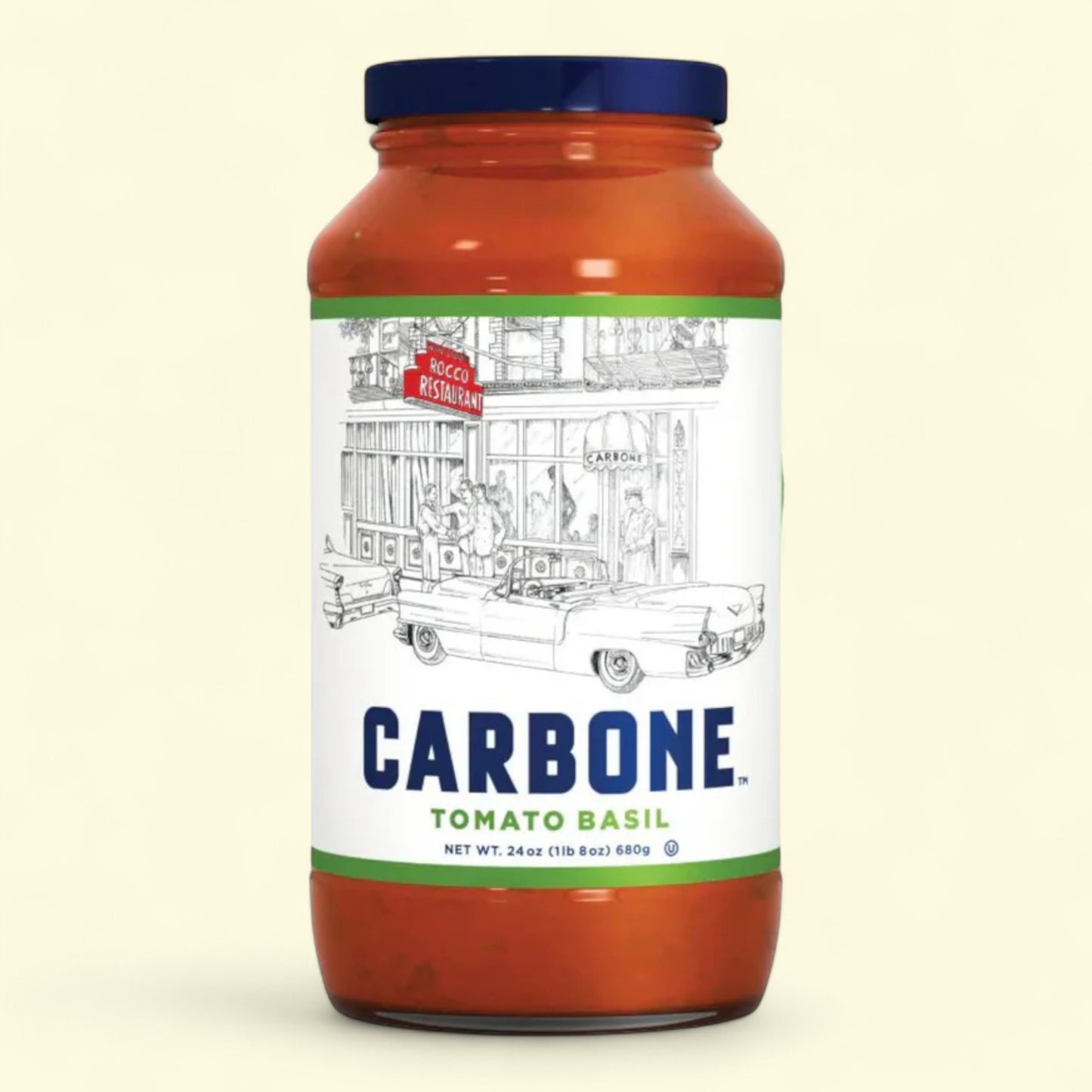 Jar of Carbone Tomato Basil pasta sauce on a beige background