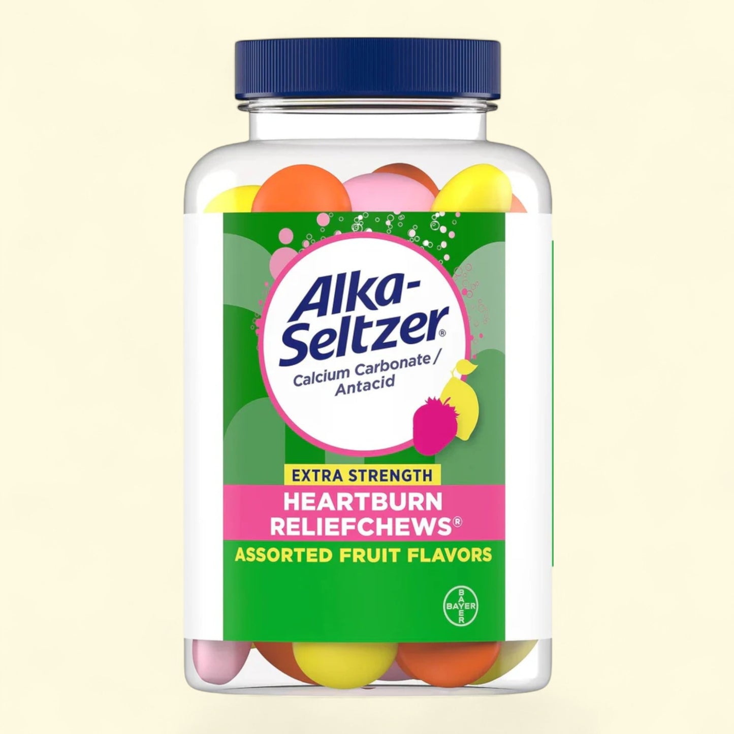 Alka-Seltzer heartburn relief chews in assorted fruit flavors on a beige background