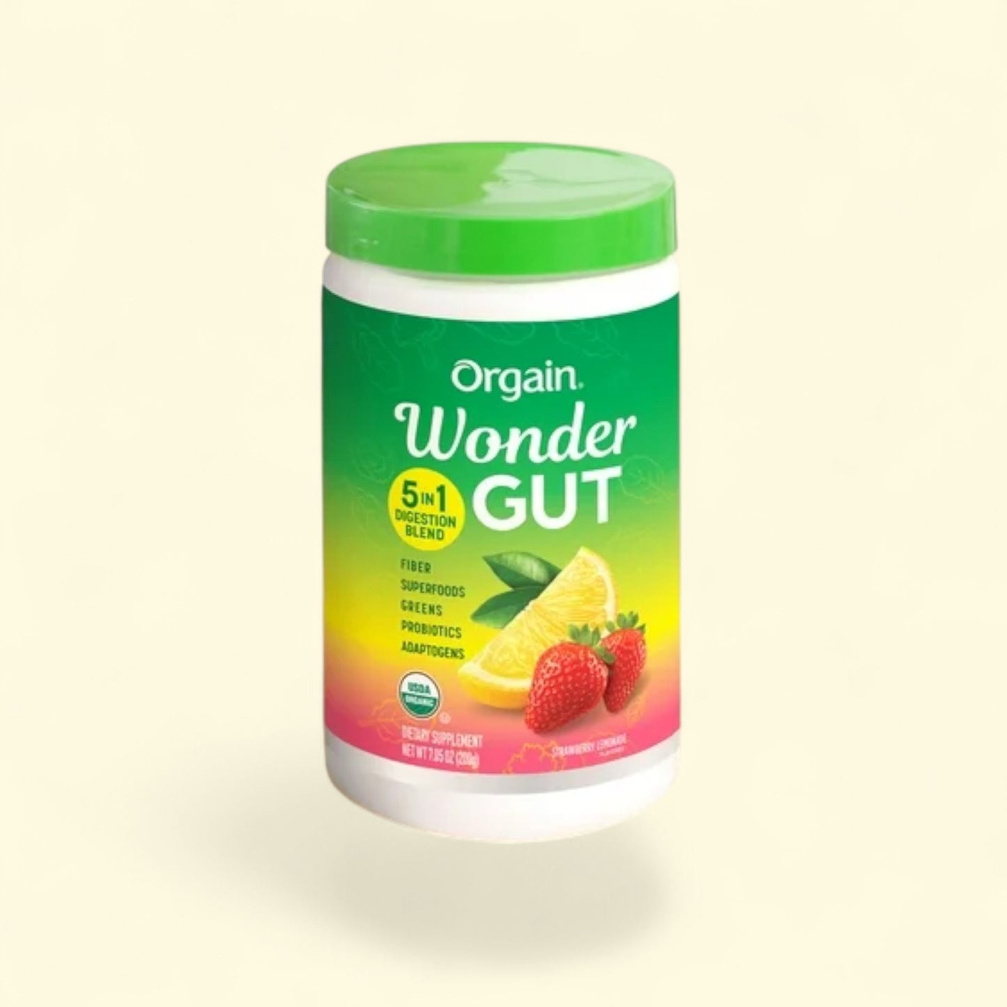 Orgain Wonder Gut supplement container on a beige background
