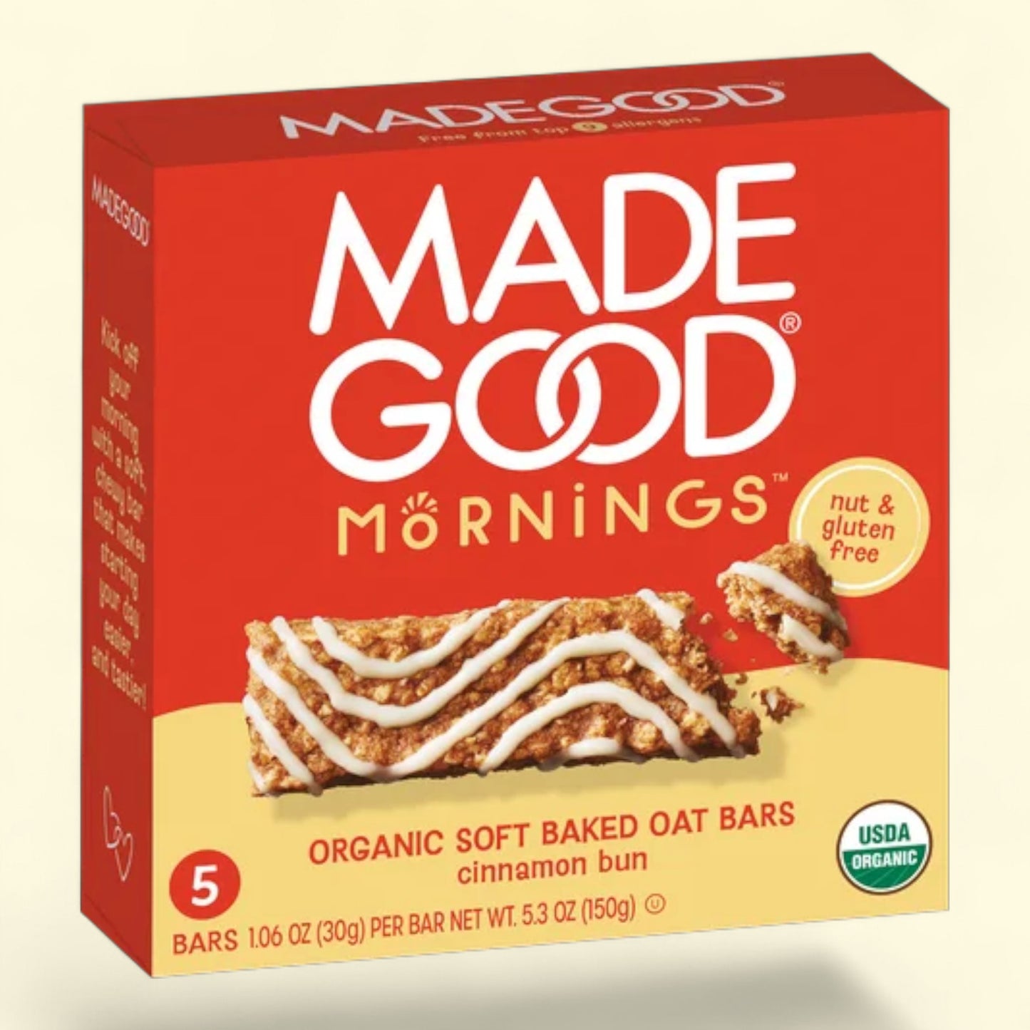 Made Good Mornings organic soft baked oat bars cinnamon bun on a beige background