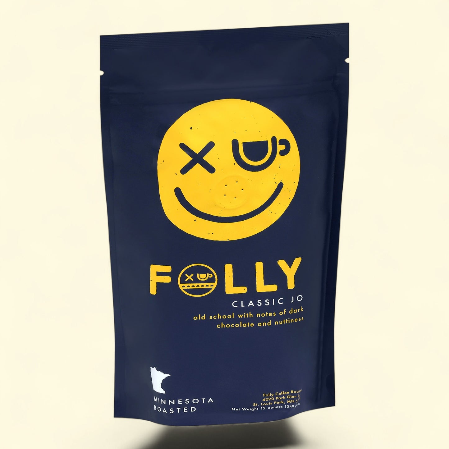 Treatspree Local Folly Coffee Classic Jo, 10oz bag with yellow smiley face and "Folly Classic Jo" text. Medium roast whole bean coffee.
