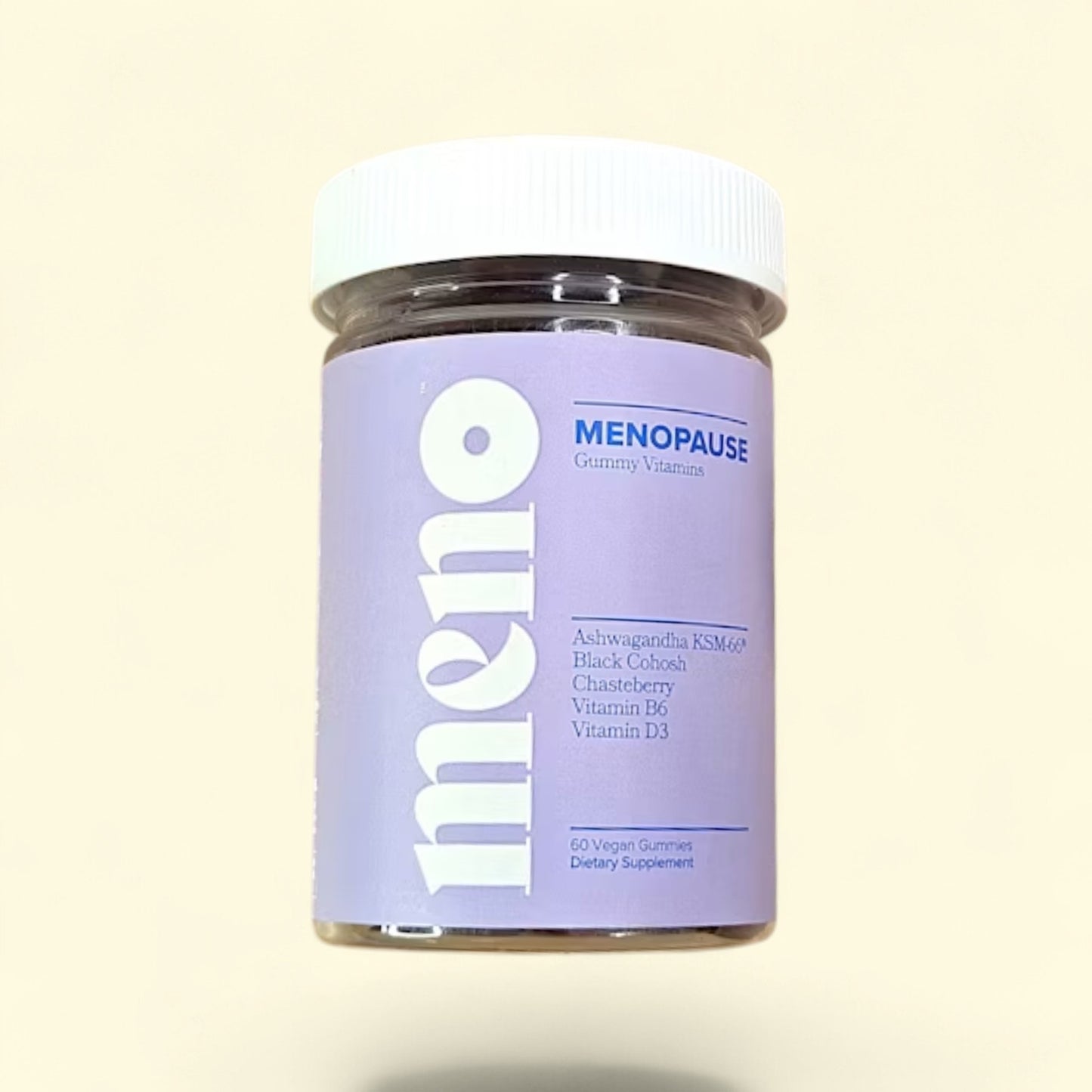 Treatspree MENO Menopause Relief Gummy Vitamins bottle with two berry-flavored gummies on the side.