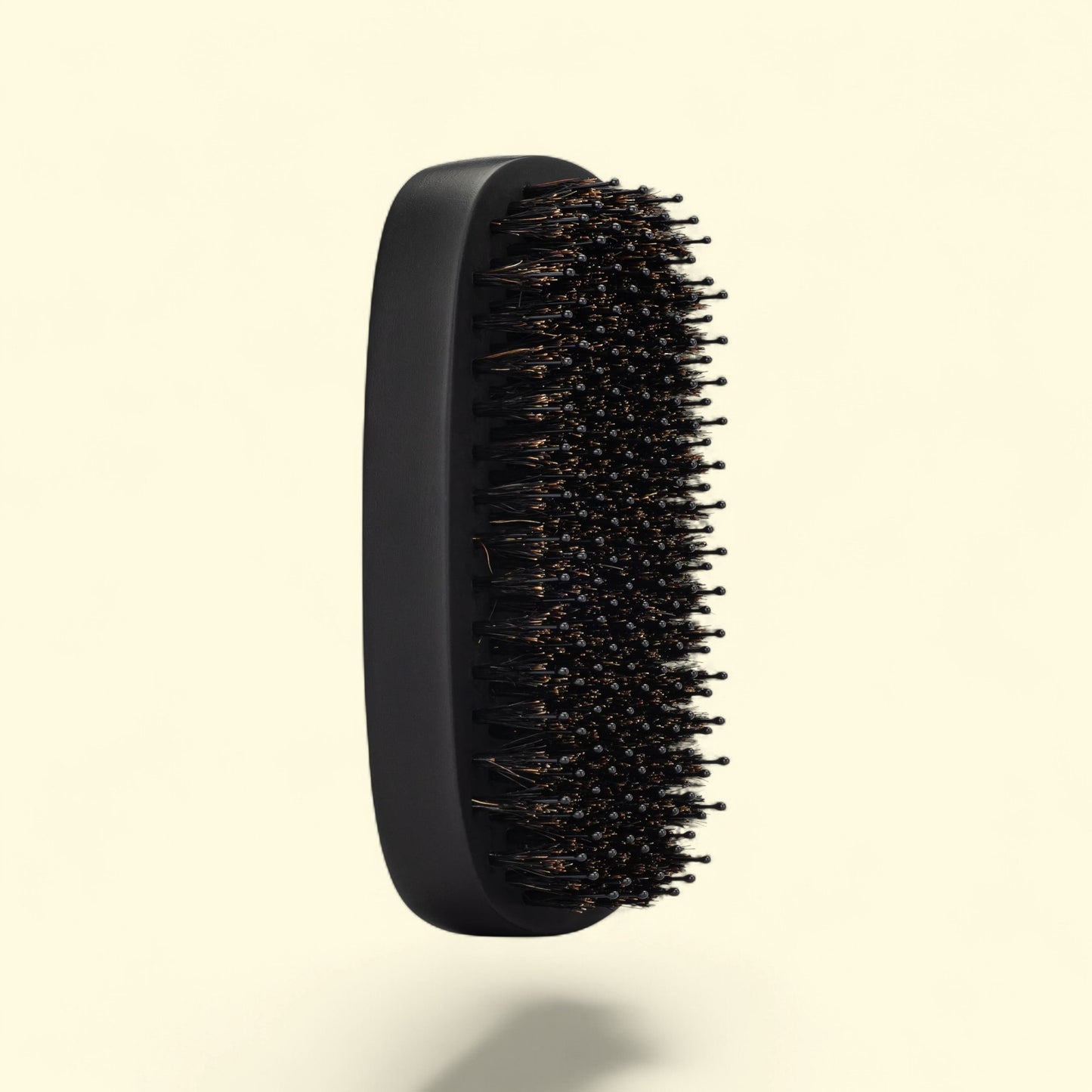 Treatspree Men's black palm brush with boar bristles for hair and beard shine enhancement.