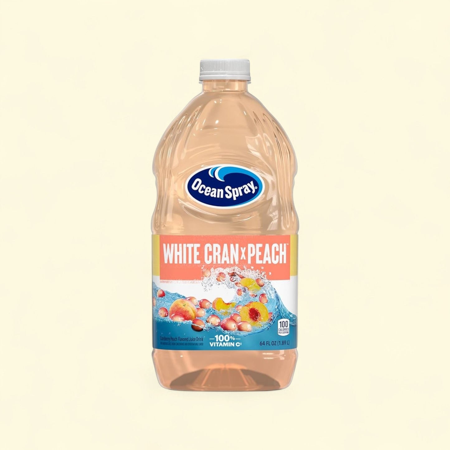 Treatspree Ocean Spray White Cran-Peach Juice Drink 64 fl oz bottle with real cranberries and peaches splashing in water.