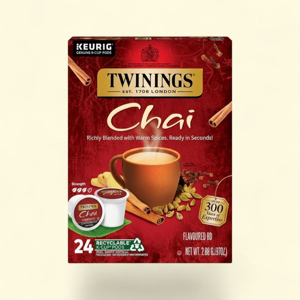 Treatspree Twinings Chai Latte K-Cup Pods, 24 count box with cinnamon sticks, cardamom, cloves, and ginger. Features a steaming mug of chai.