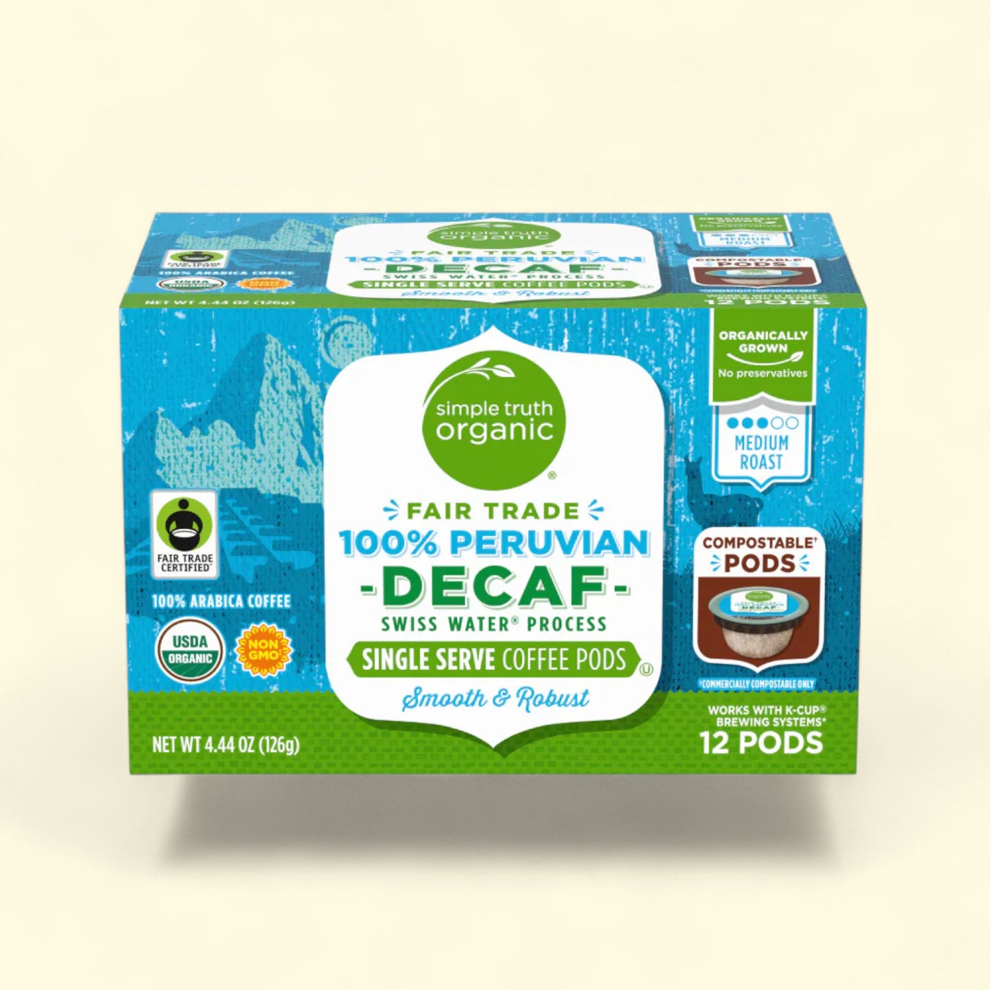 Box of Simple Truth Organic Fair Trade 100% Peruvian Decaf swiss water process single serve coffee pods on a beige background