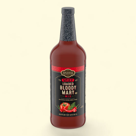 Bottle of spicy loaded bloody mary mix on a beige background
