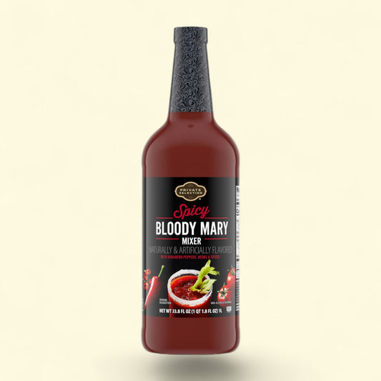 Bottle of Spicy Bloody Mary Mixer on a beige background