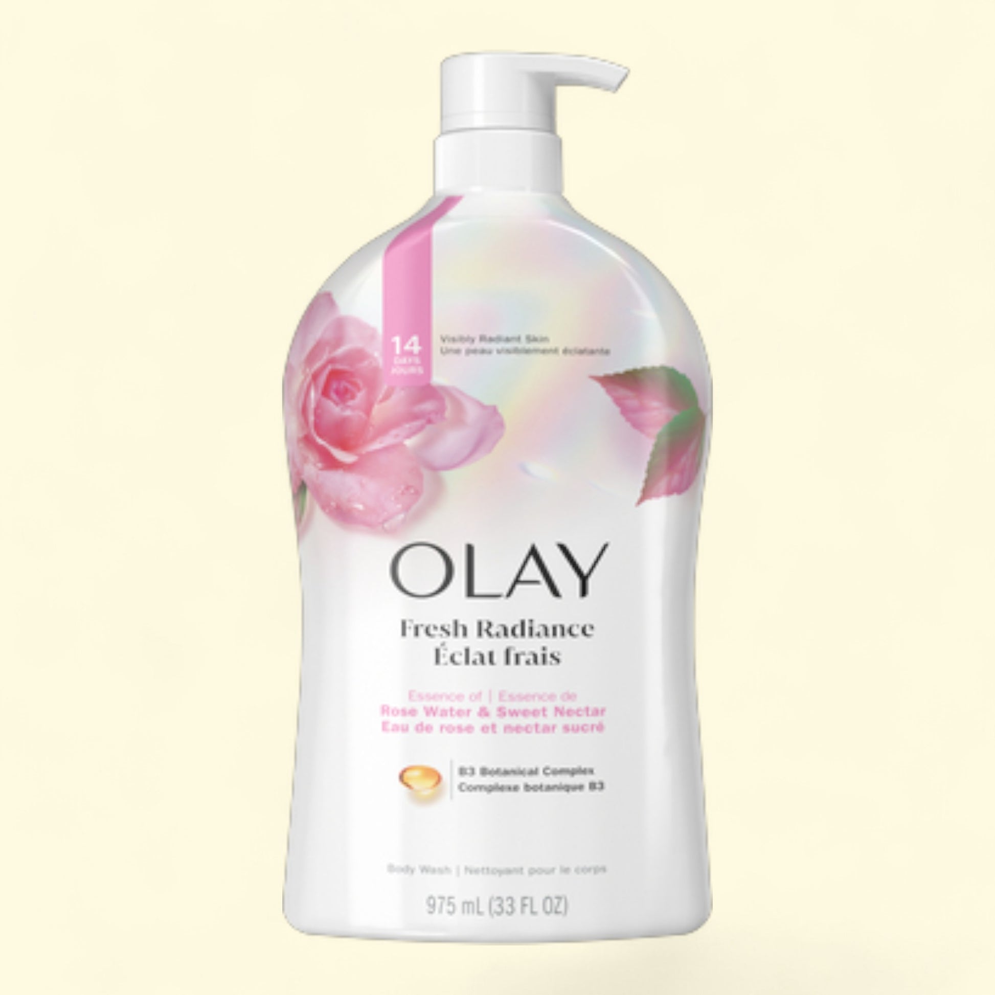 Olay Fresh Radiance body wash bottle with floral design on a light yellow background
