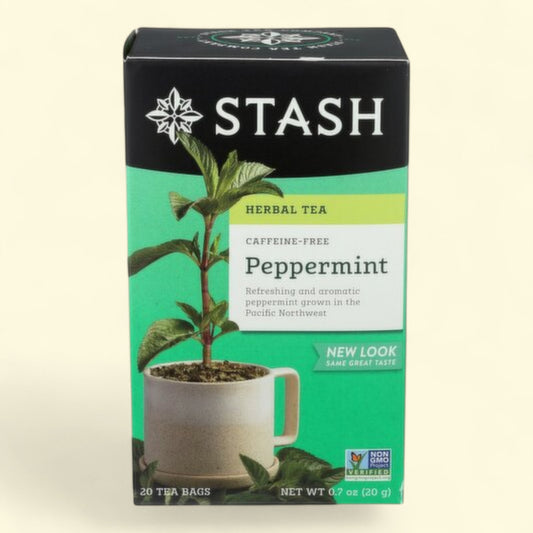 Stash Peppermint Herbal Tea box with green background and tea plant imagery