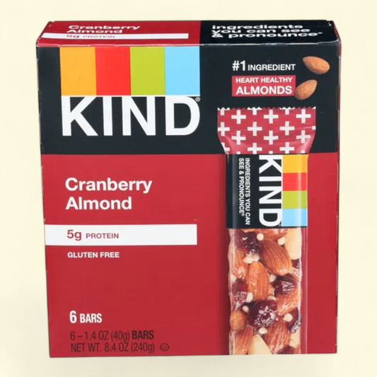 Kind Cranberry Almond bars on a beige background