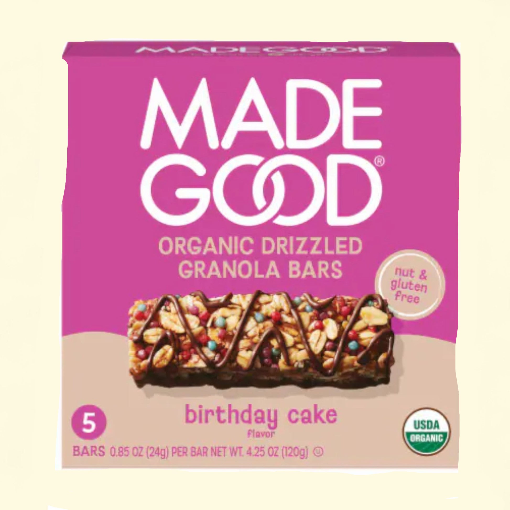 Made Good organic drizzled granola bars with birthday cake flavor on a beige background