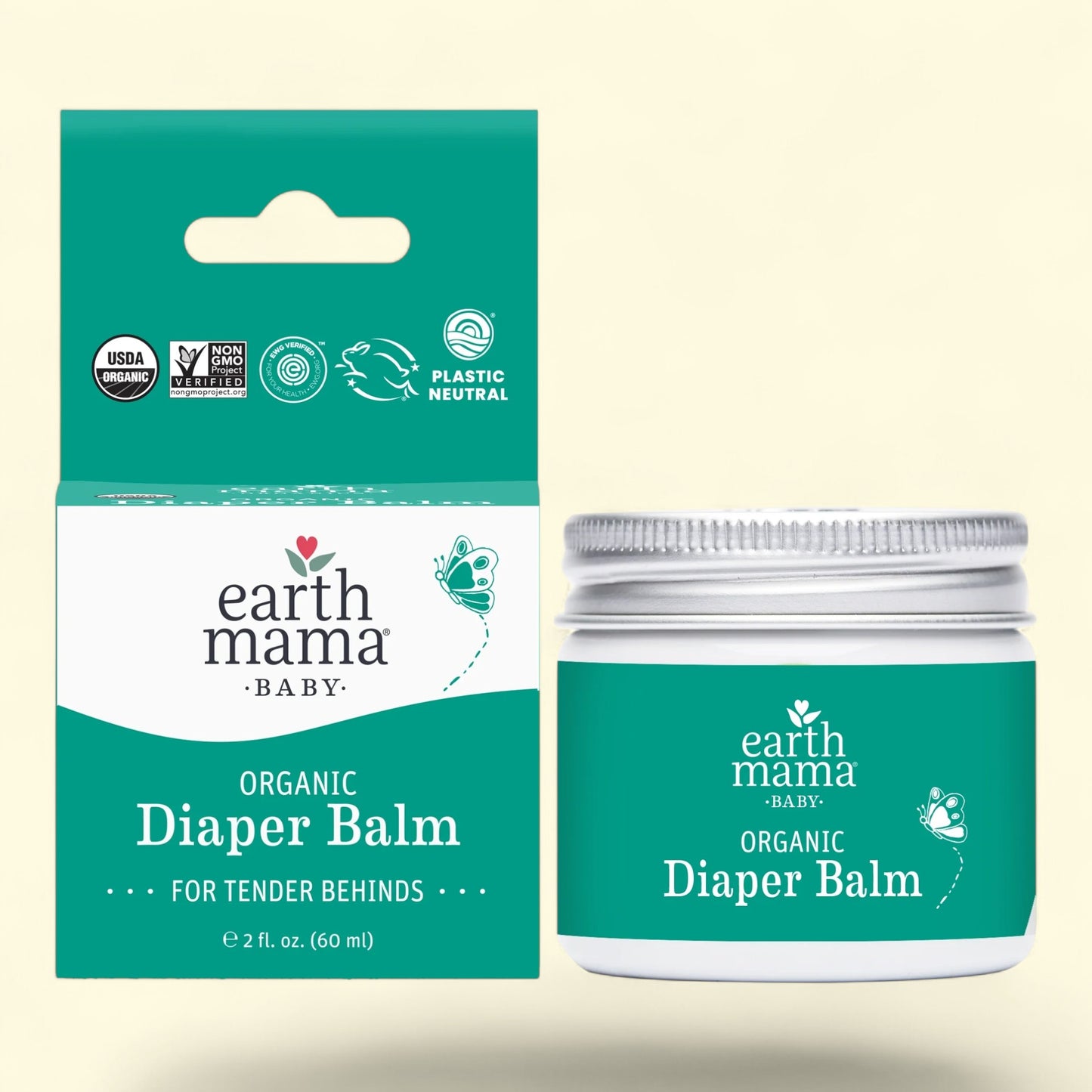 Emballage et pot du baume pour le change bio Earth Mama sur fond beige