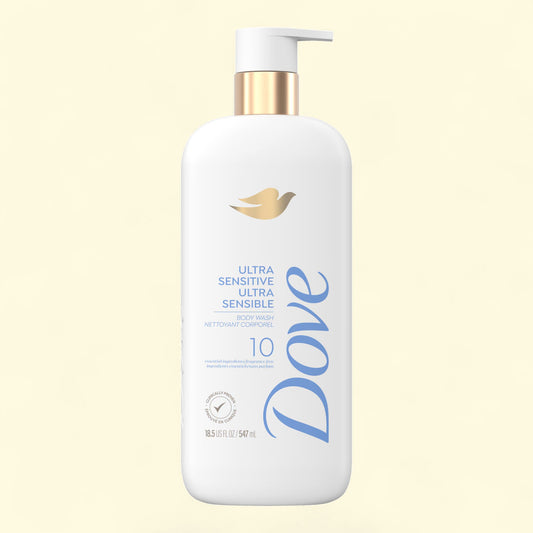 Dove ultra sensitive body wash bottle on a light beige background