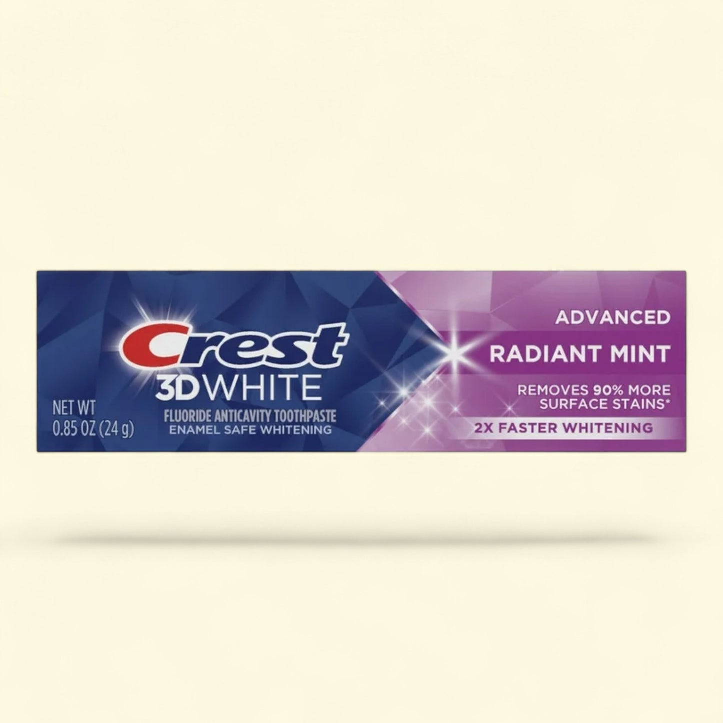 Crest 3D White toothpaste tube on a beige background