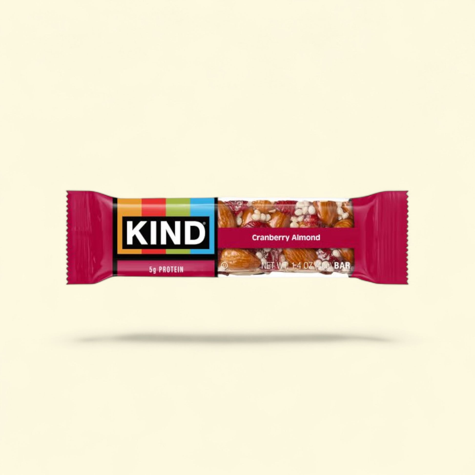 Kind Cranberry Almond protein bar on a beige background