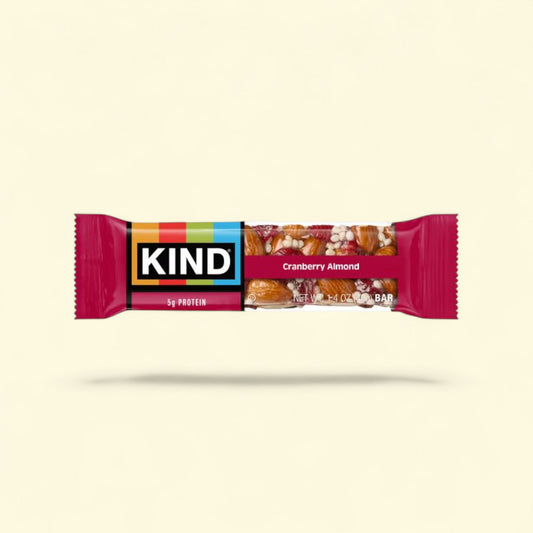 Kind Cranberry Almond protein bar on a beige background