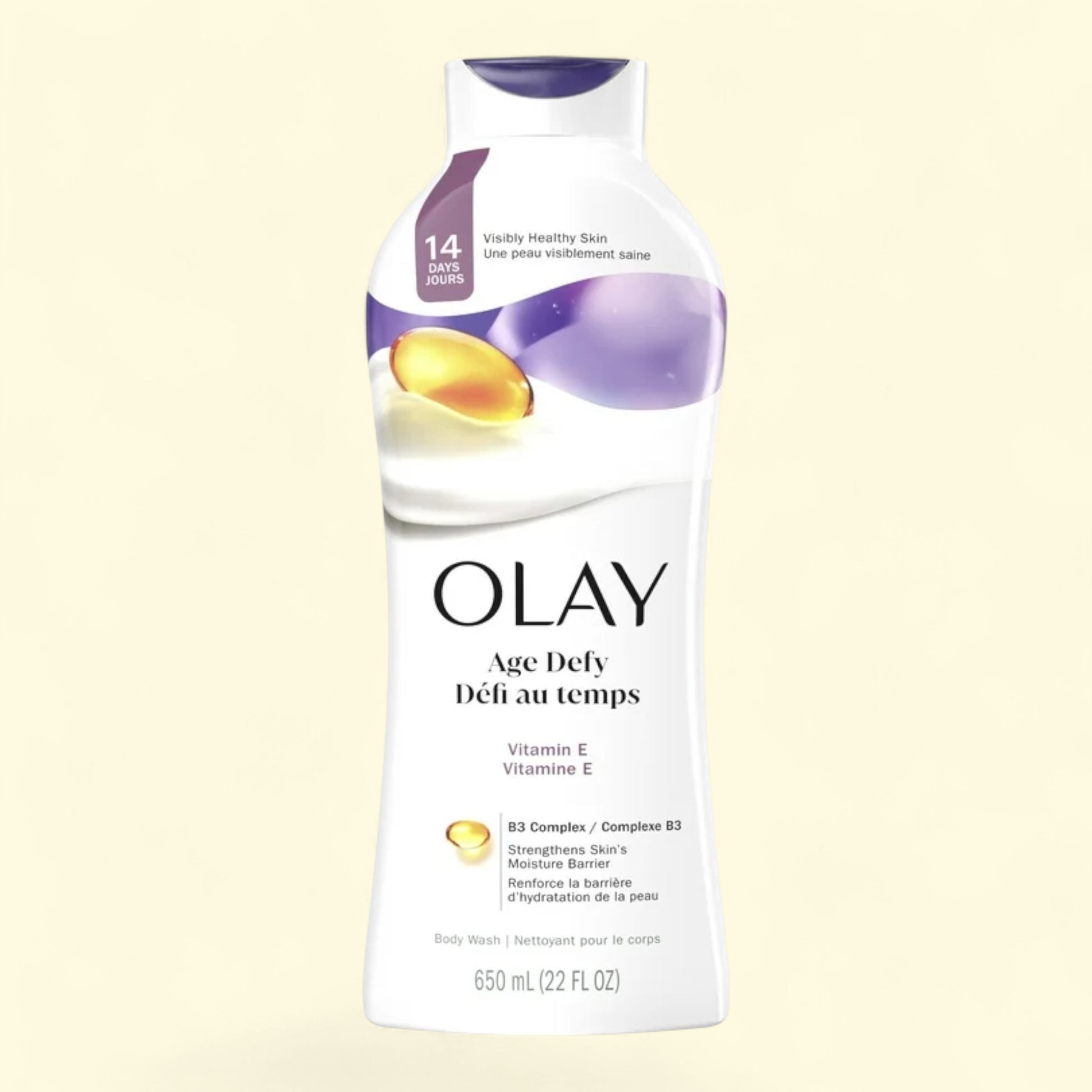 Olay Age Defy body wash bottle on a light beige background