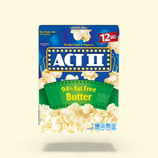 Act II popcorn package with blue 12 bags and green design on a beige background