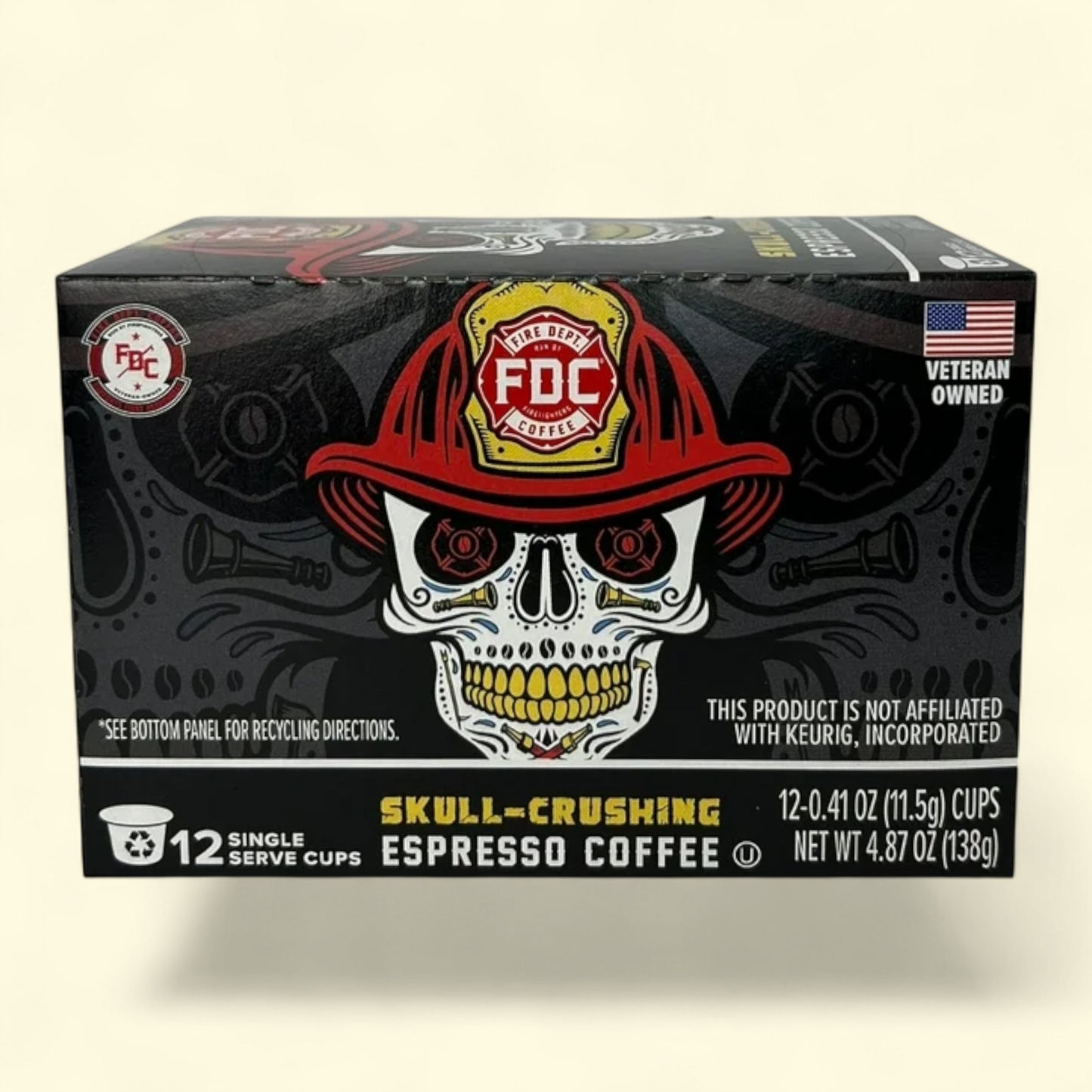 Box of FDC Coffee single serve cups with skull design and red fire helmet