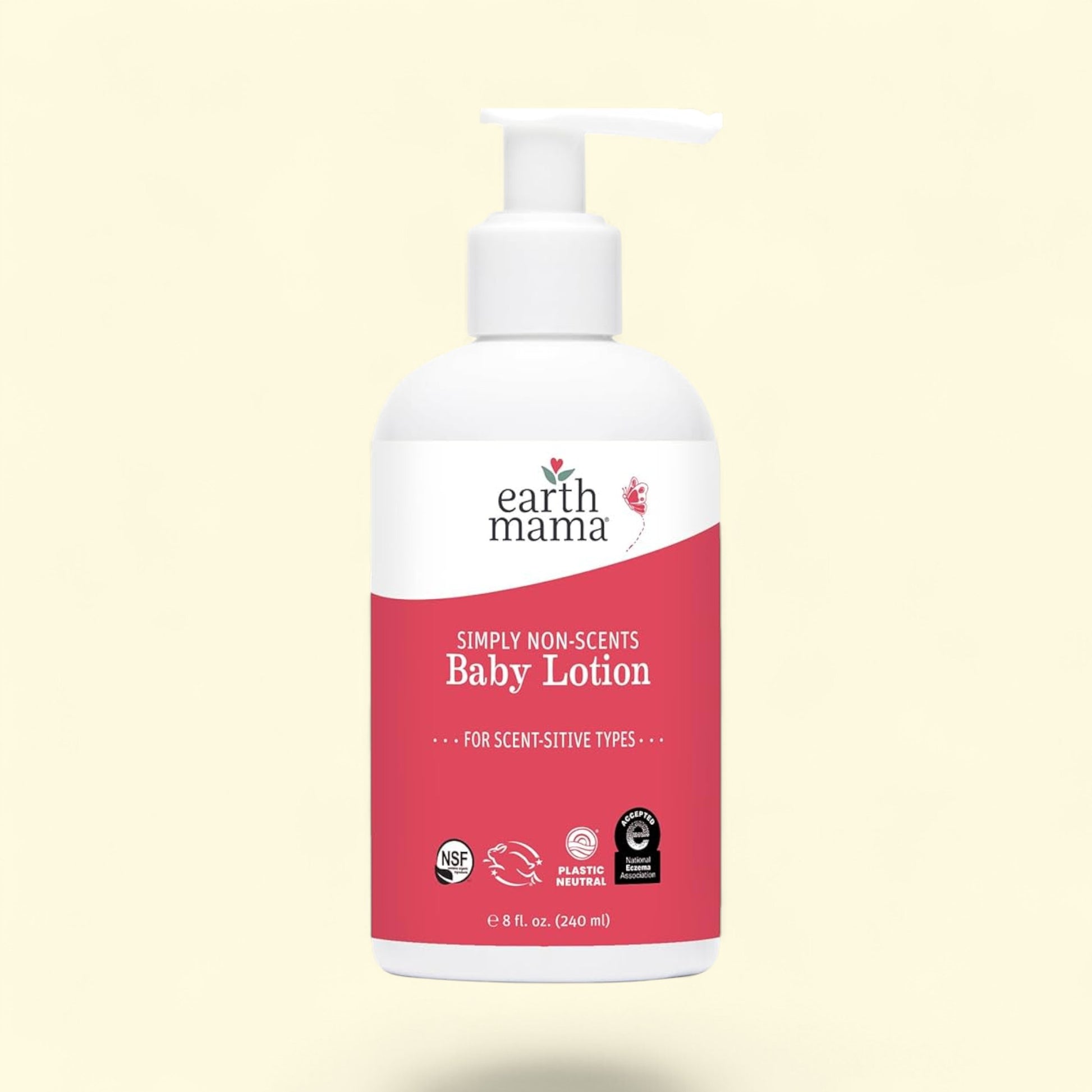 Flacon de lotion pour bébé « Simply Non-Scents » de Earth Mama sur fond jaune clair