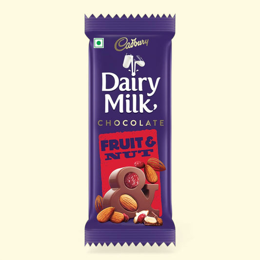 Cadbury Dairy Milk Fruit & Nut chocolate bar packaging on a beige background